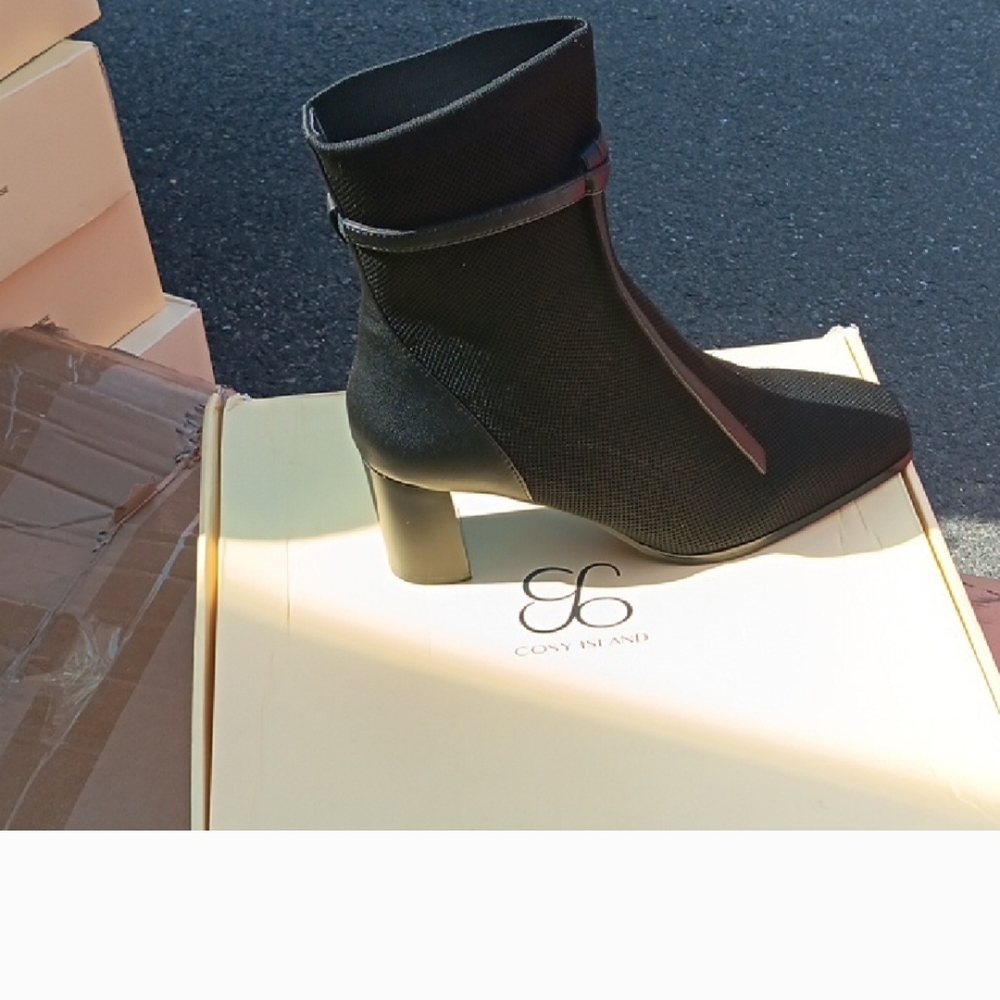 Elegant Black Heeled Boots by Coxy Island